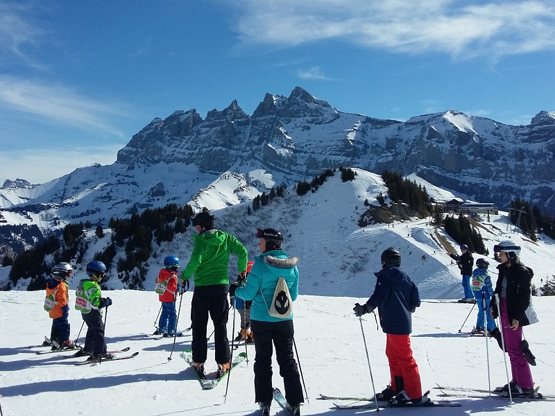 Geneva Ski Transfers People skiing in front of the Dents du Midi in Champery, Switzerland
